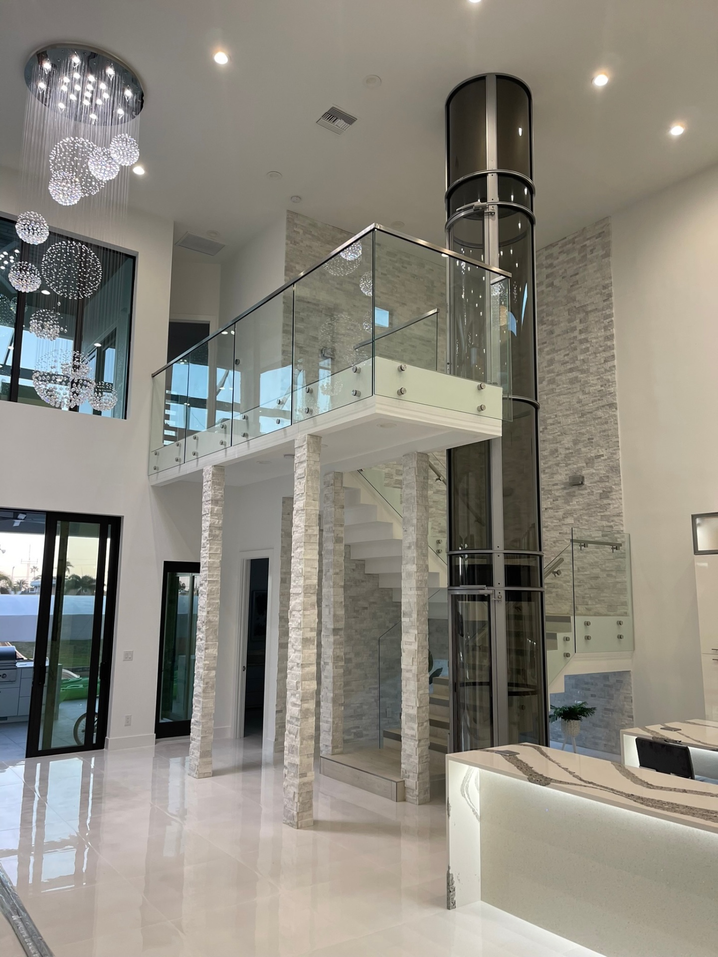 Frameless shower enclosure