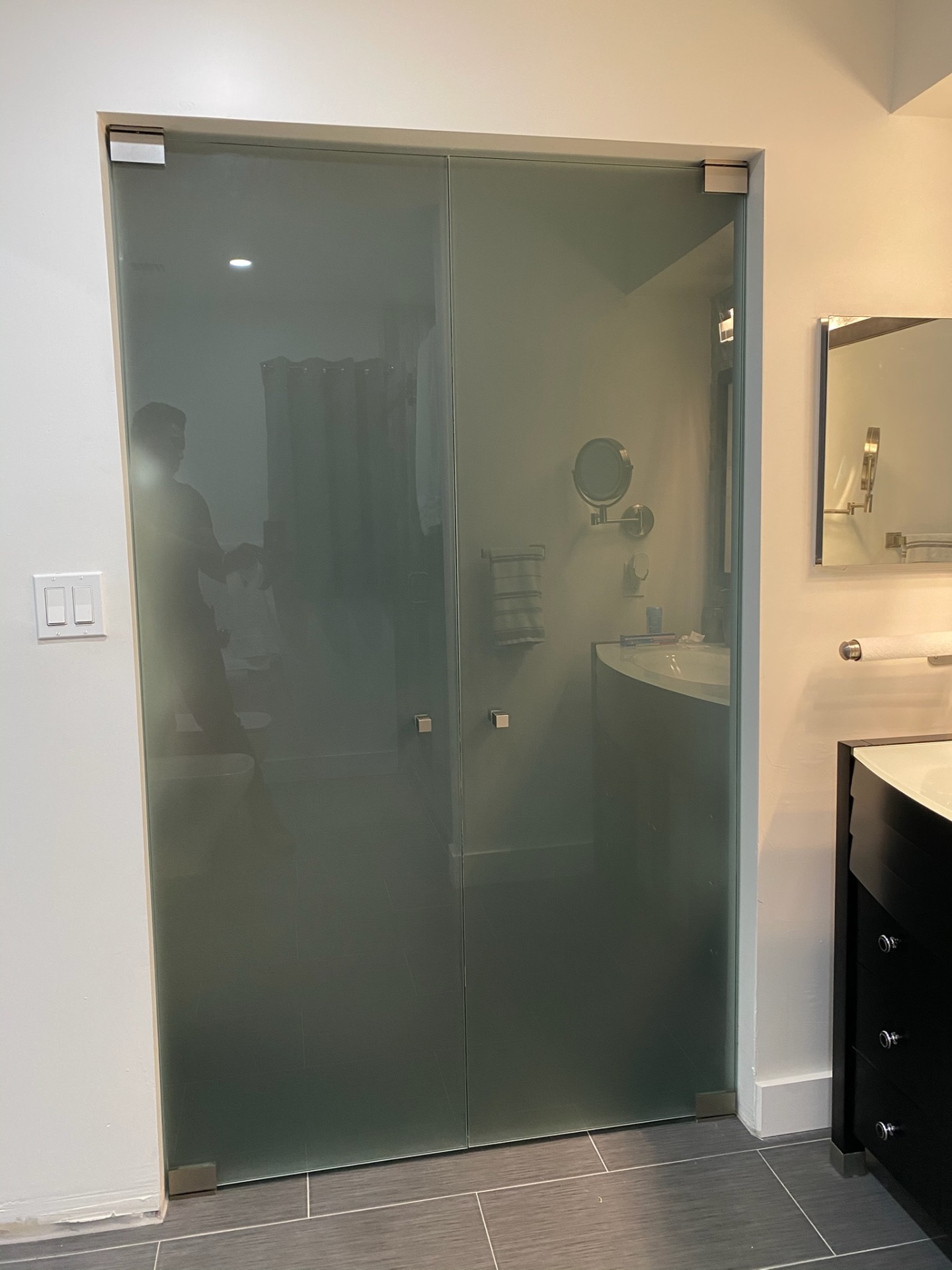 Luxury bathroom with glass partition