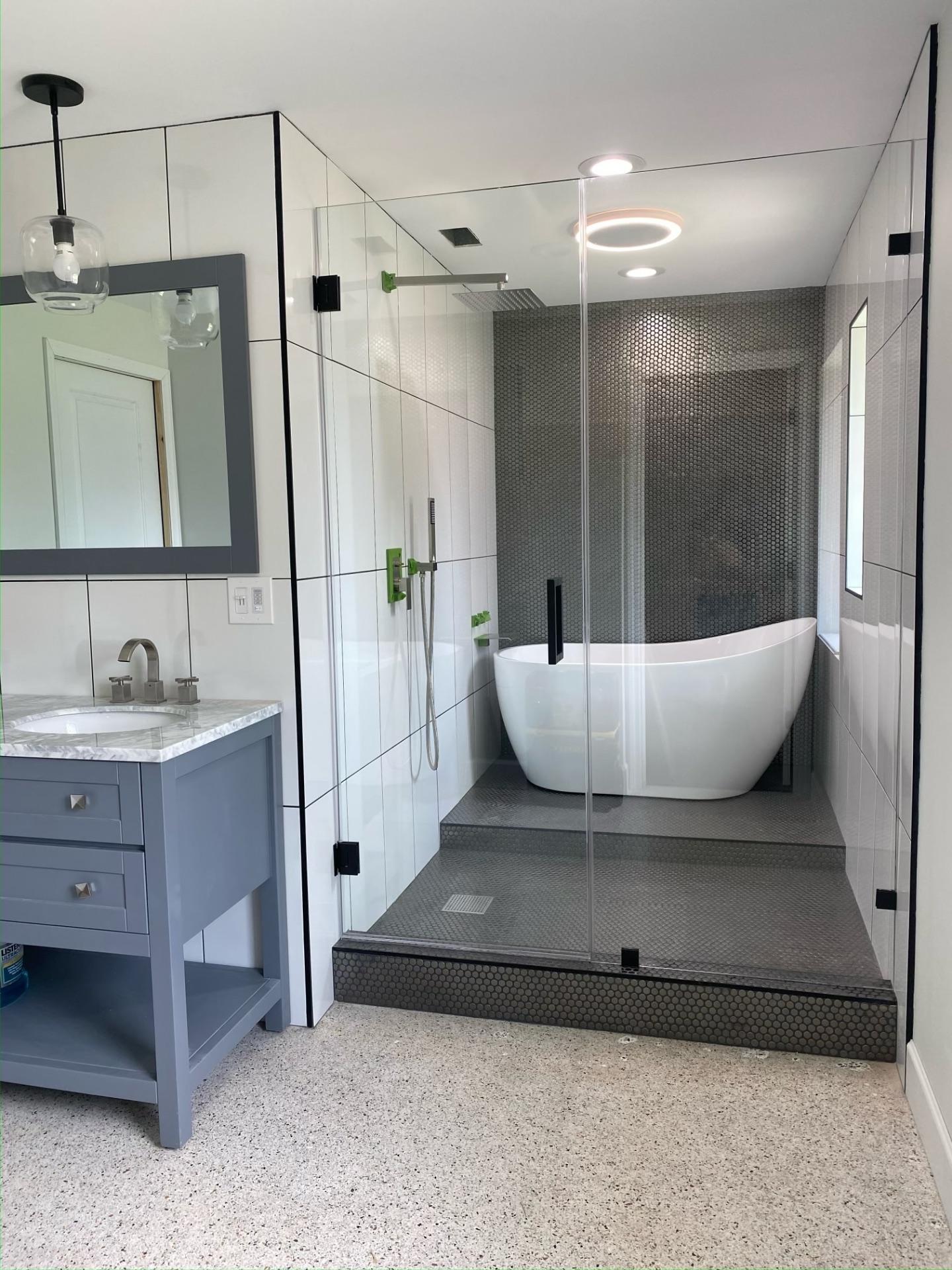 Frameless shower enclosure