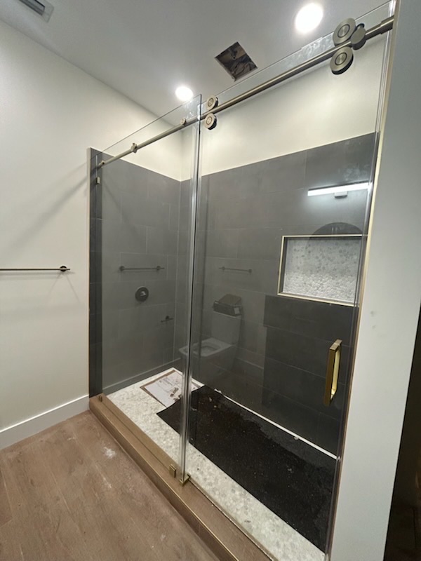Luxury bathroom with glass partition